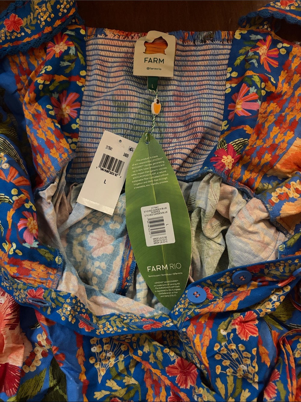 FARM Rio Blue Floral Romper with Orange & Green Accents - Picture 2 of 2